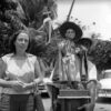 Elizabeth Schön junto a la imagen de San Juan niño. Estado La Guaira, Venezuela, circa 1955: Alfredo Cortina © Archivo Fotografía Urbana